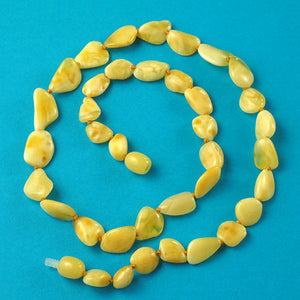 Attractive And Unique Flat Bean Natural White Amber Necklace