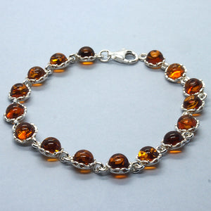 Amber and Silver Bracelet - round stones in intricate design