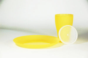 plastic cup with lid and plate yellow